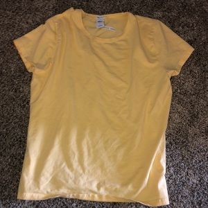 Yellow T-shirt.